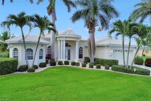Exterior - Villa Starlight 1036 SW Cape Coral 3b  3ba Heated Pool and Spa Gulf Access Canal, Boat Dock Tiki Hut (Cape Coral)