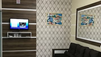 Family Apartment, Multiple Beds, Non Smoking | Living area | LED TV