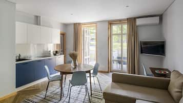 Deluxe Apartment, 2 Bedrooms, Accessible | Living area | Flat-screen TV