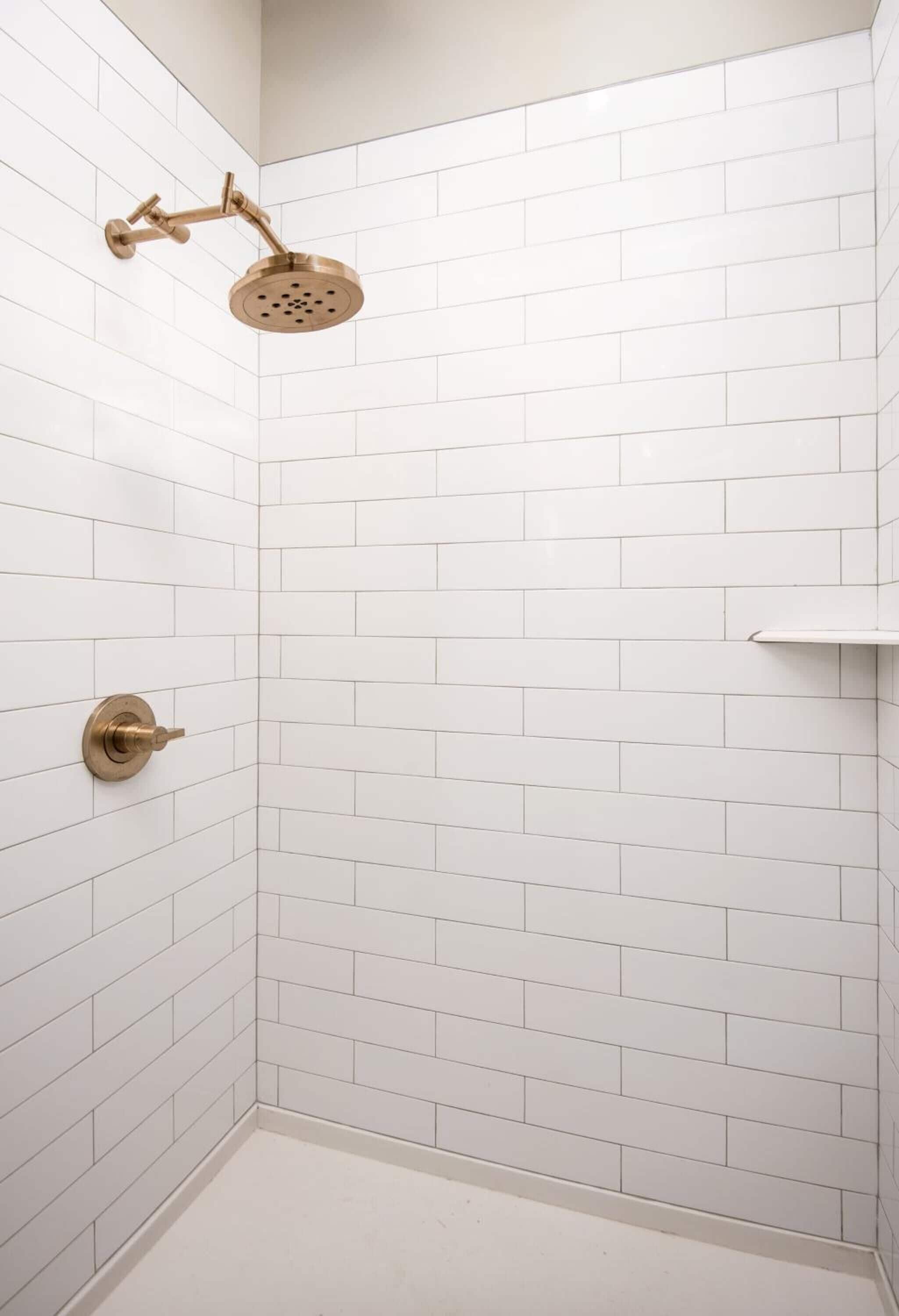 deep-soaking bathtub, rainfall showerhead, designer toiletries