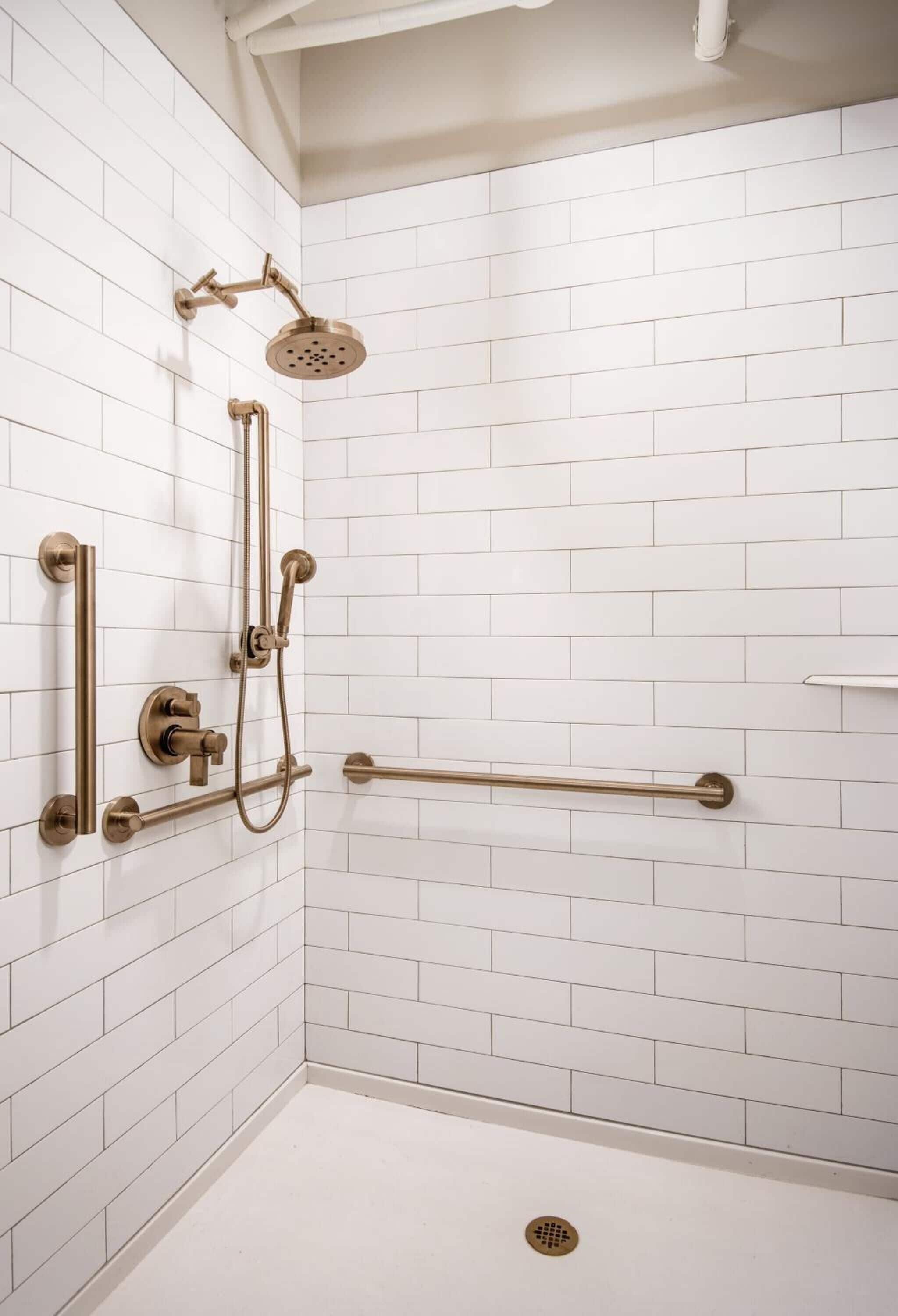 deep-soaking bathtub, rainfall showerhead, designer toiletries