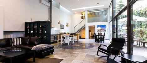 Loft, 4 Bedrooms | Living area | TV