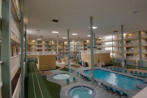 Indoor pool, seasonal outdoor pool, pool umbrellas, pool loungers