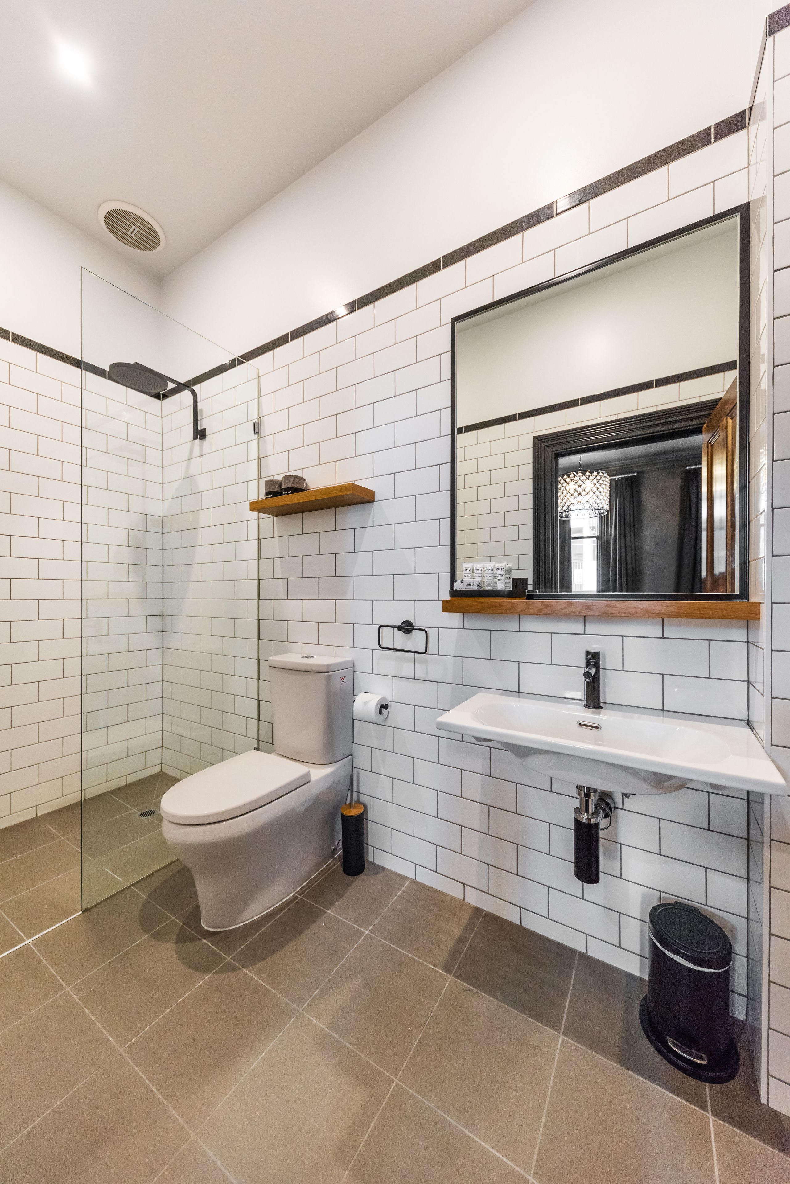 deluxe studio | bathroom | shower, hair dryer, towels