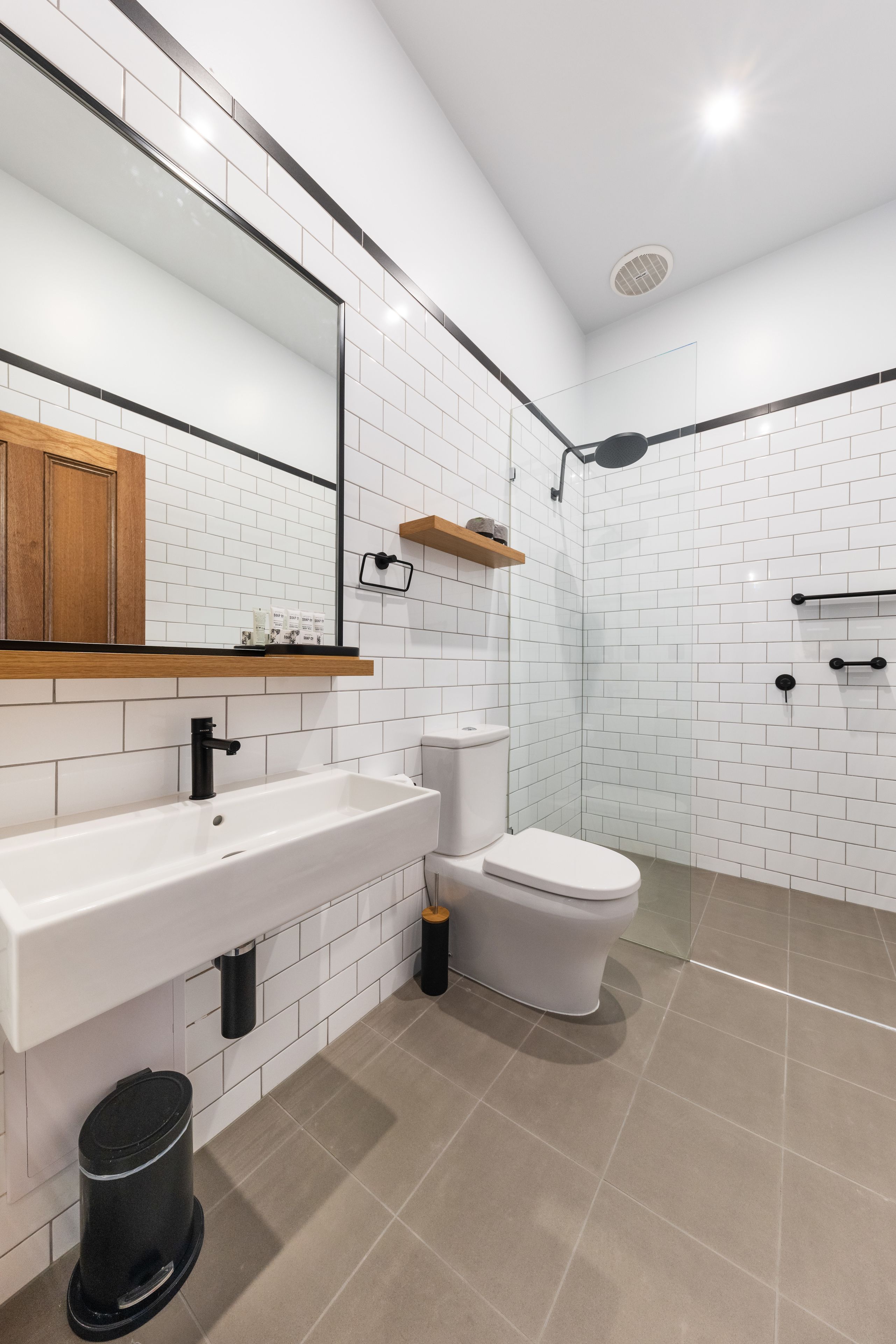 deluxe studio | bathroom | shower, hair dryer, towels