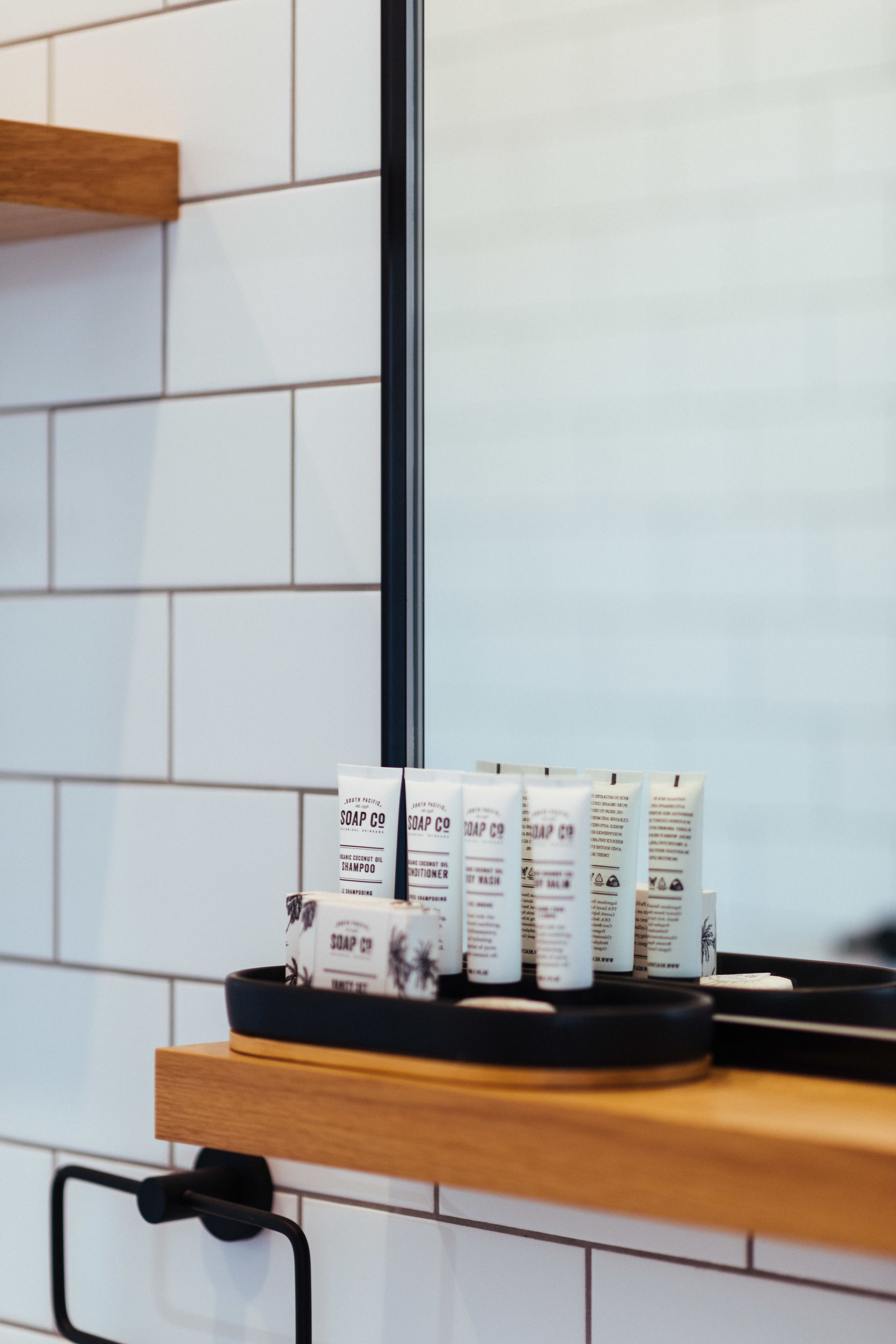 deluxe studio suite | bathroom amenities | shower, hair dryer, towels