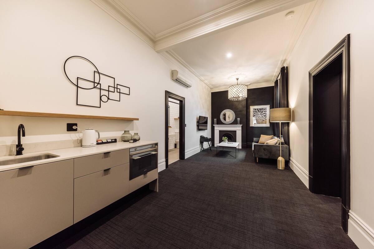 deluxe single room | living area | smart tv, netflix