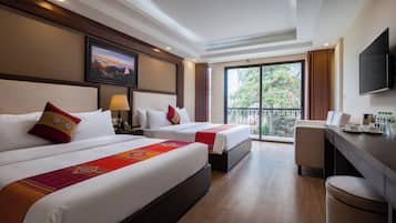 Family Quadruple Room, Garden View | Premium bedding, minibar, in-room safe, desk