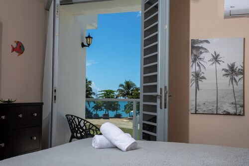 Beachfront in gated community with patio,  balcony, pool, close to all in Rincón