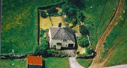 Cosy holiday cottage in the National Park with stunning views and new kitchen.