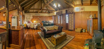 Romantic Cottage, 1 Queen Bed (Ironbark) | Living area | Flat-screen TV, fireplace, DVD player