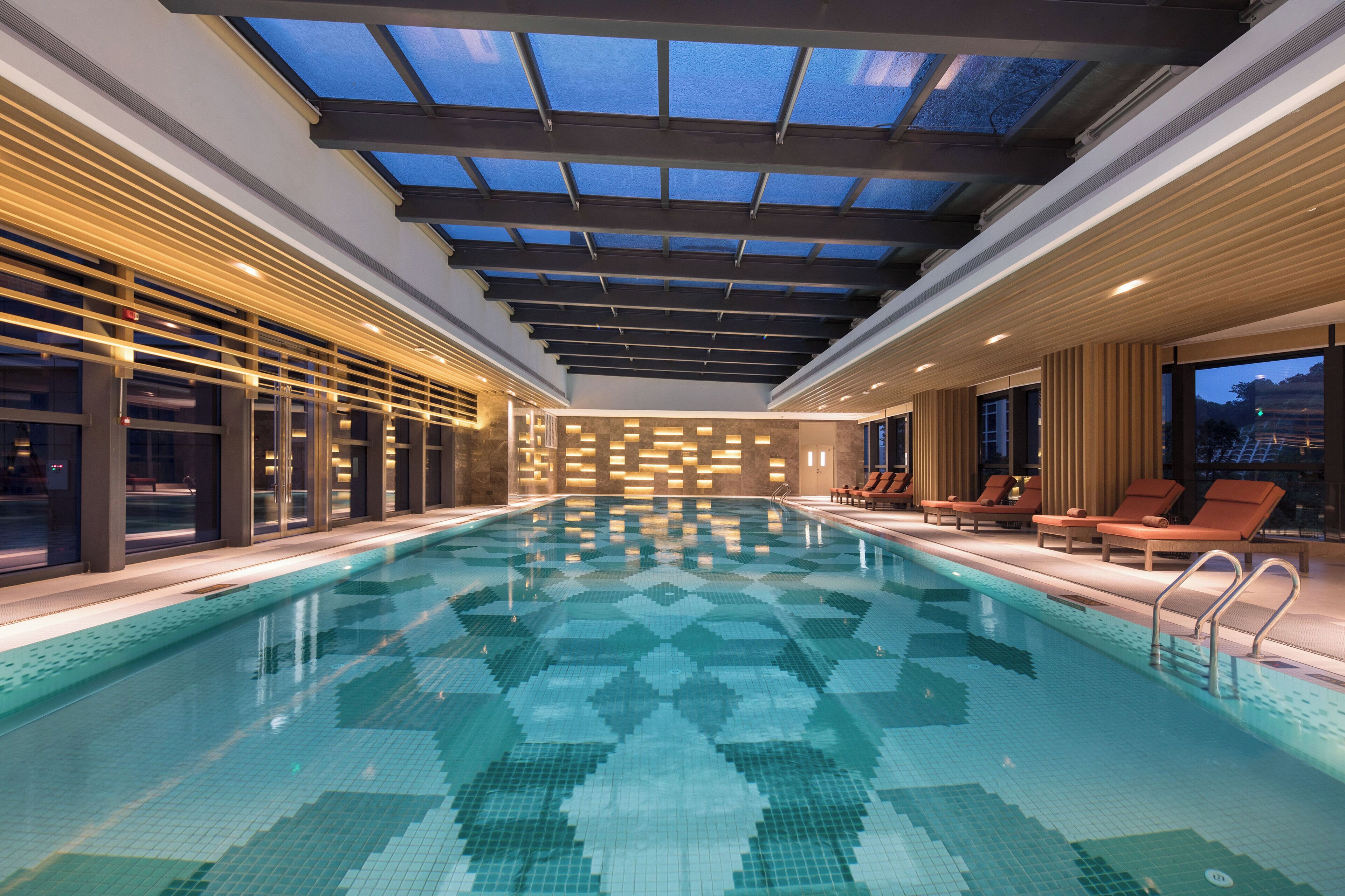 Indoor pool, open 7:00 AM to 10:00 PM, sun loungers