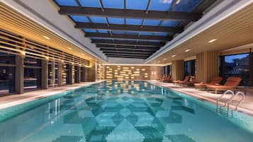 Indoor pool, open 7:00 AM to 10:00 PM, sun loungers