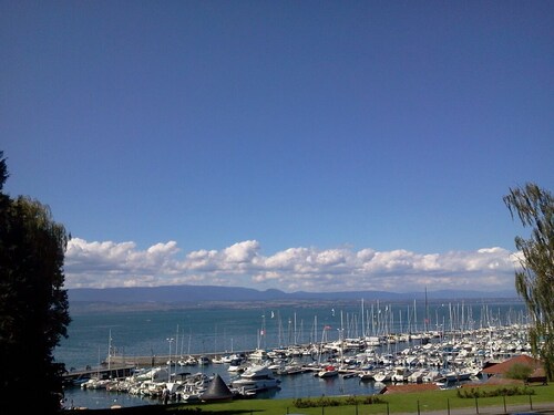 Restored fisherman's house View of Lake Geneva on the port of Thonon Rives