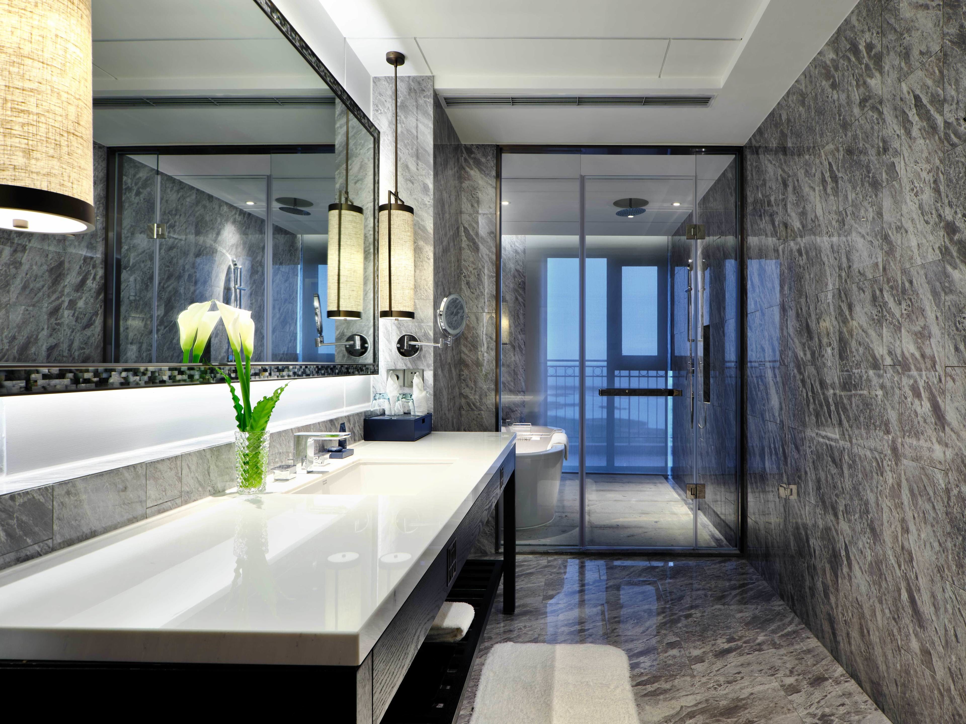 separate bathtub and shower, hair dryer, bathrobes, slippers