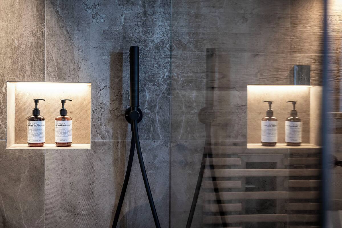 shower, rainfall showerhead, designer toiletries, hair dryer