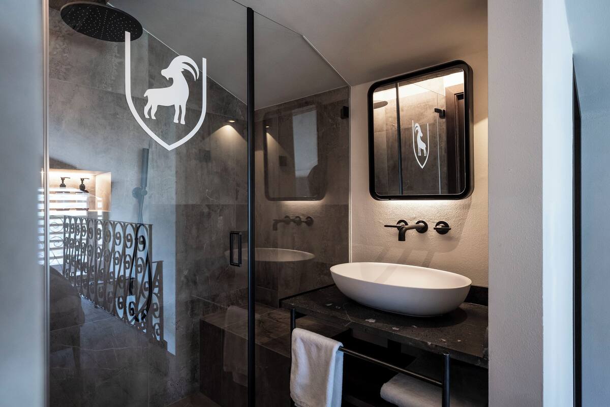 duplex | bathroom | shower, rainfall showerhead, designer toiletries, hair dryer