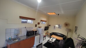 Family Room, 1 Double Bed with Sofa bed | Living area | Flat-screen TV - Maison Ambre Guesthouse (Windhoek)