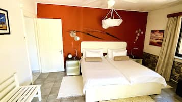 Family Room, Multiple Beds | Living area | Flat-screen TV