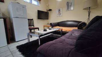 Family Twin Room, 2 Twin Beds | Minibar, in-room safe, individually decorated, desk