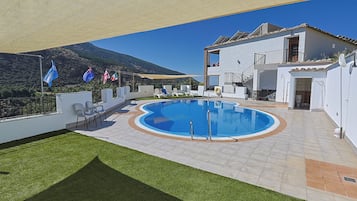 Seasonal outdoor pool, pool umbrellas, sun loungers