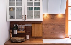 Fridge, stovetop, dishwasher, coffee/tea maker