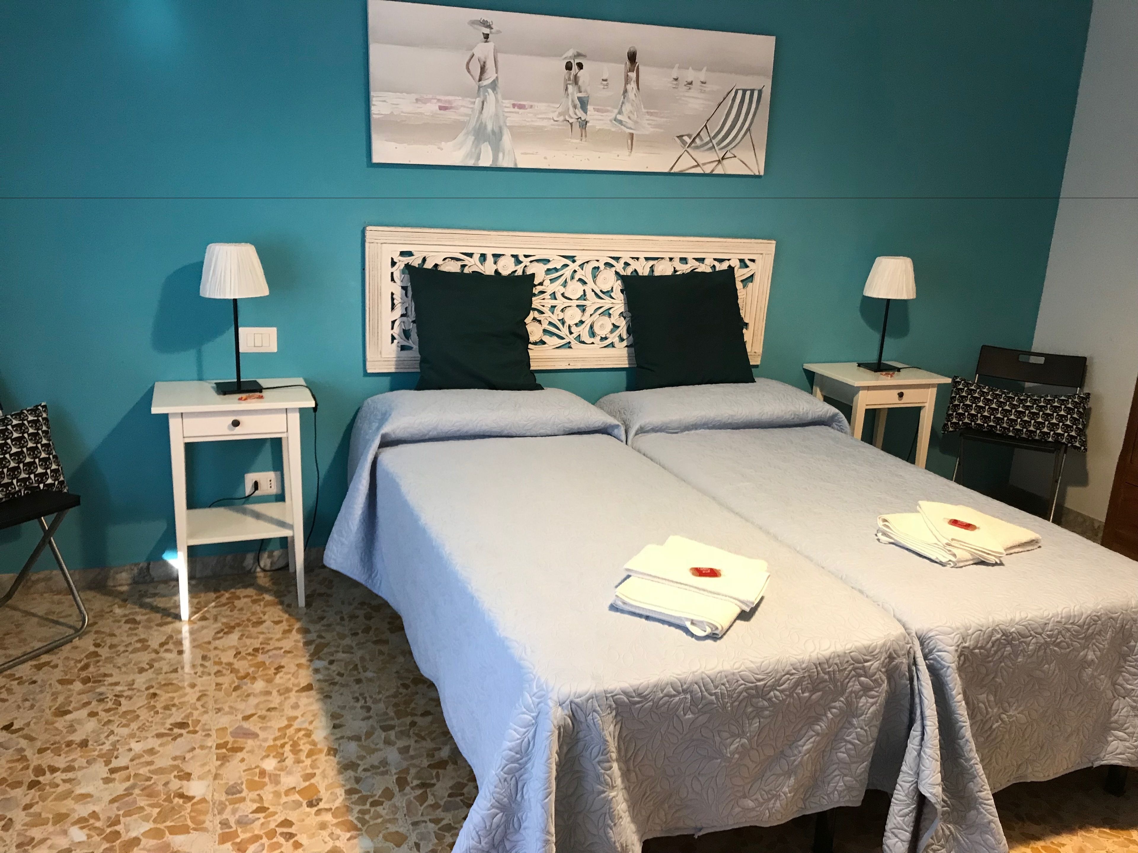 Down comforters, desk, blackout drapes, free cribs/infant beds