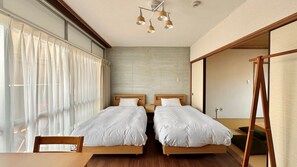 Phòng dành cho gia đình, không hút thuốc (With bathroom, shared toilet) | Truy cập Internet không dây miễn phí, bộ trải giường 