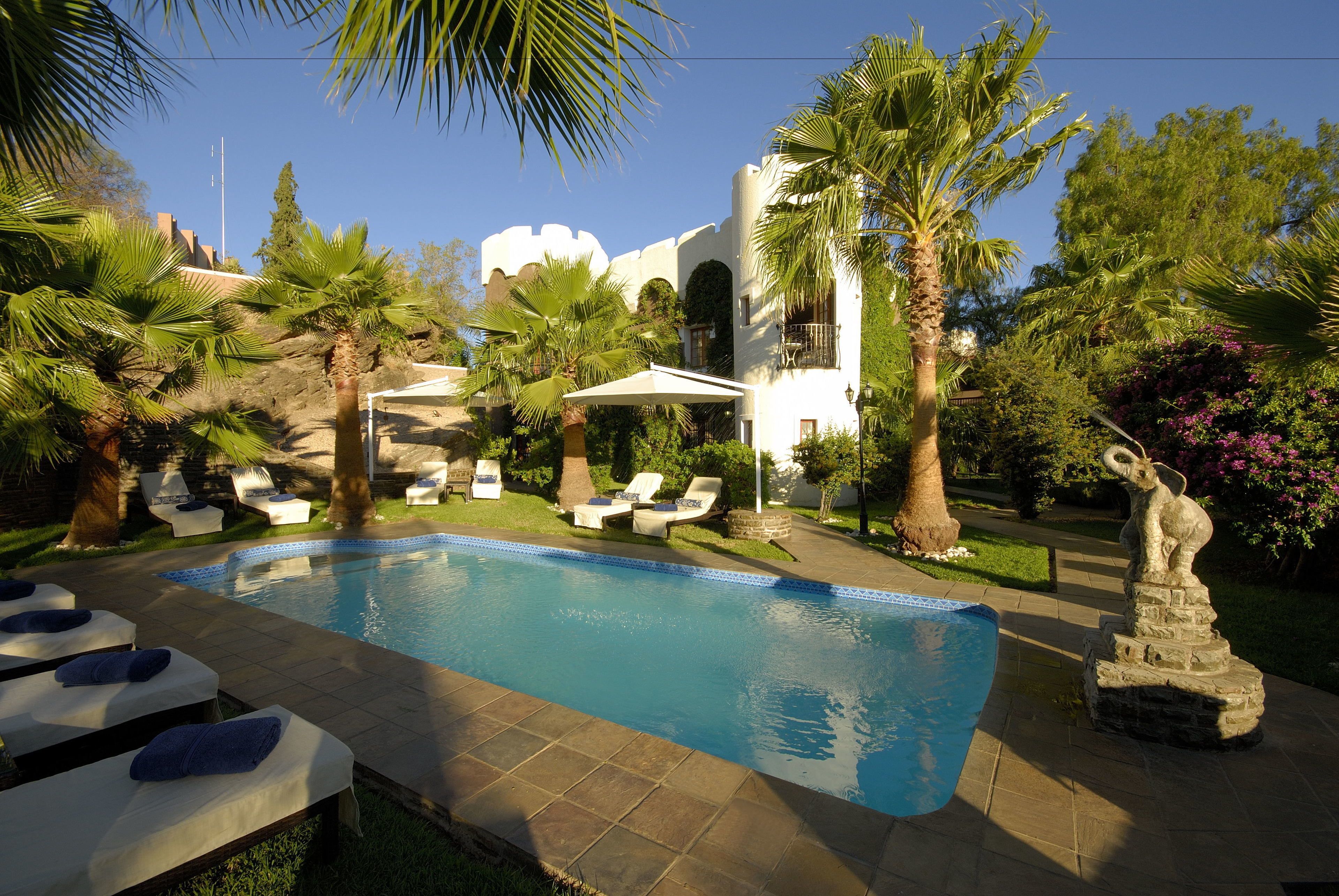 outdoor pool, pool loungers