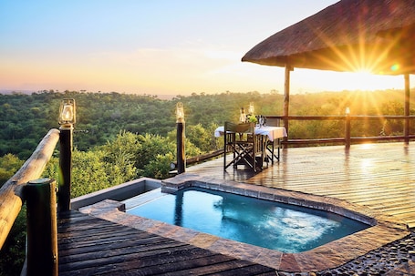 Outdoor pool, pool loungers. Parsons Hilltop Safari Camp