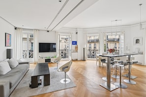 Flat-screen TV, video games, DVD player, table tennis