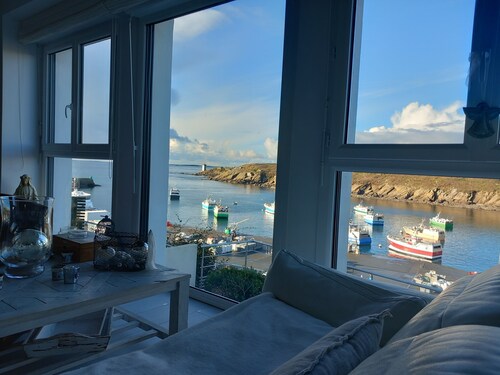 Comfortable house nestled above the harbour with a breathtaking sea view