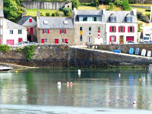 Comfortable house nestled above the harbour with a breathtaking sea view