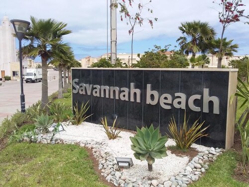 Villa front pool and garden at Savannah beach
