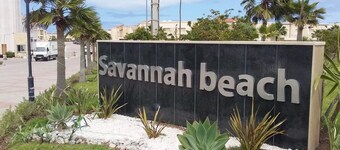 Villa front pool and garden at Savannah beach