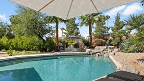 A swimming pool with lounge chairs and a pergola overhead. - SWSS Luxury 7BR Estate | Pickleball | Basketball Pool & Hot Tub | Putting Green | Games (Scottsdale)