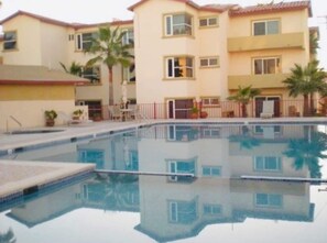 Outdoor pool - Look no further... stay at our amazing condo and enjoy your vacation... (Rosarito)