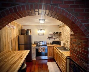 Coffee/tea maker, fridge, microwave, oven