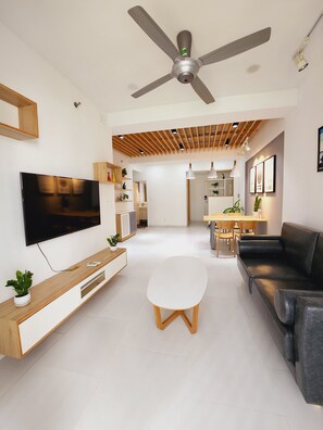 Apartment, 2 Bedrooms, Balcony | Living area | 54-inch flat-screen TV with cable channels, TV - Scenic Valley Suite (Ho Chi Minh City)