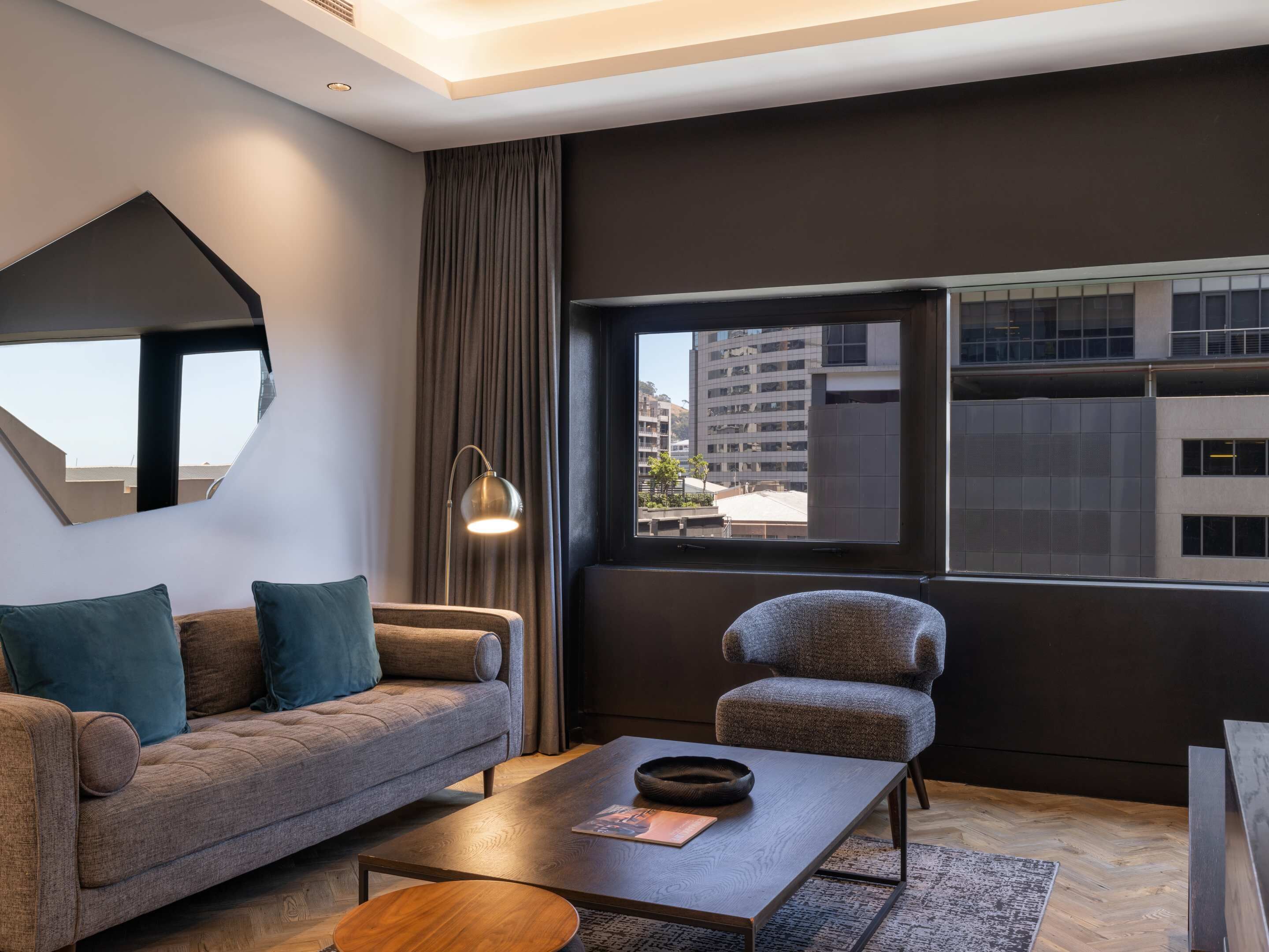 Studio, 1 King Bed, City View | Living area | Flat-screen TV