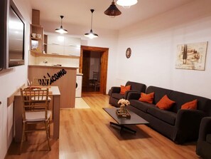 Deluxe Apartment, 1 Bedroom, Non Smoking, Balcony (Mitropoliei 4) | Living room | Flat-screen TV - RR Apartment (Sibiu)