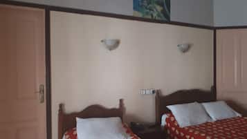 Triple Room | Desk, blackout drapes, rollaway beds, free WiFi