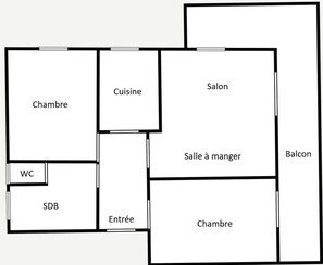Ein Grundriss mit Wohnzimmer, Küche, Essbereich, zwei Schlafzimmern, einem Badezimmer, einem Balkon und einer Toilette.