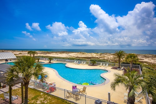Waterfront Gulf condo with beach access, shared pool
