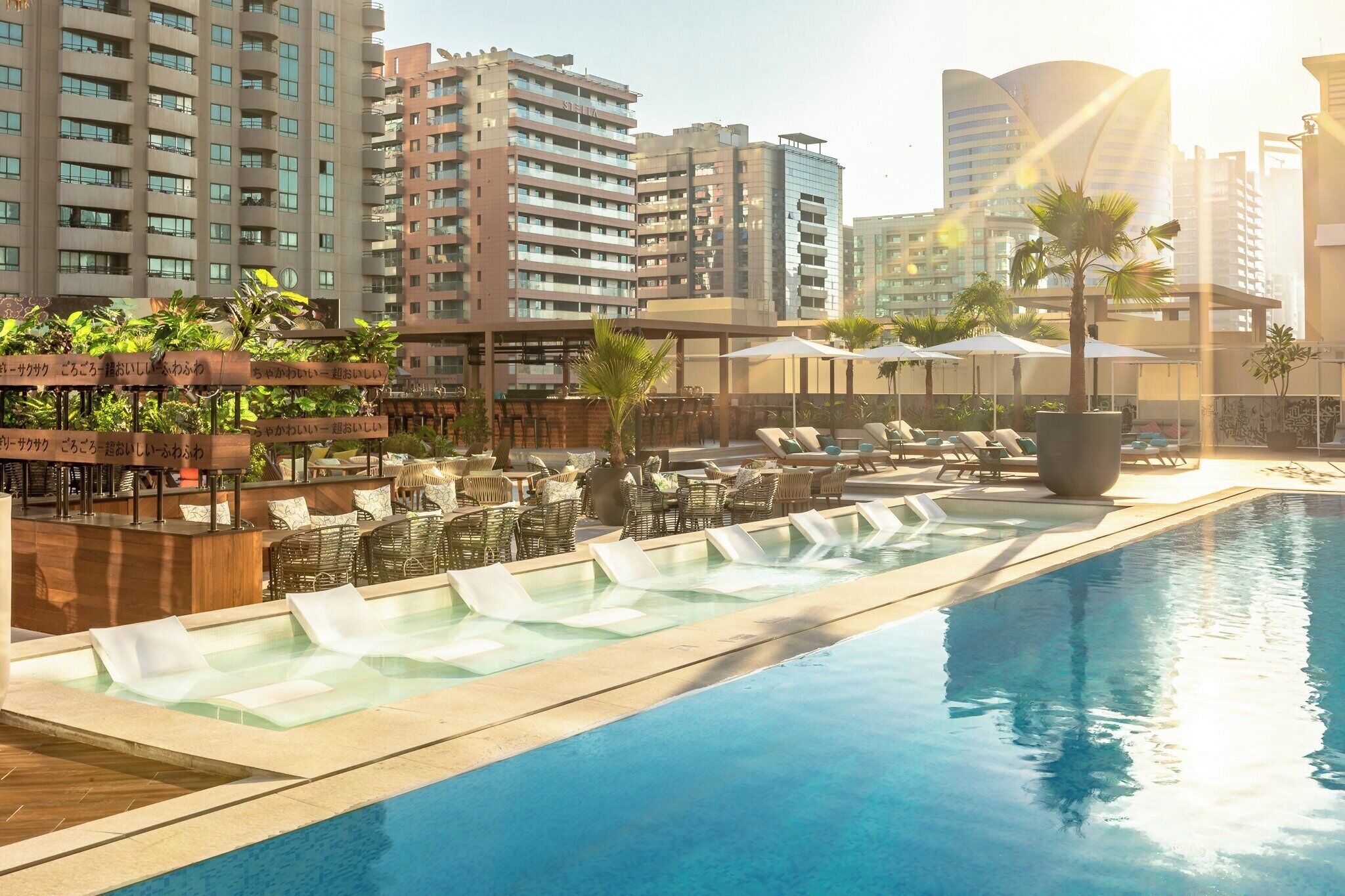 Outdoor pool, pool umbrellas, sun loungers