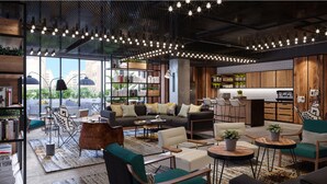 Un interior moderno con zona de estar, cocina y comedor.
