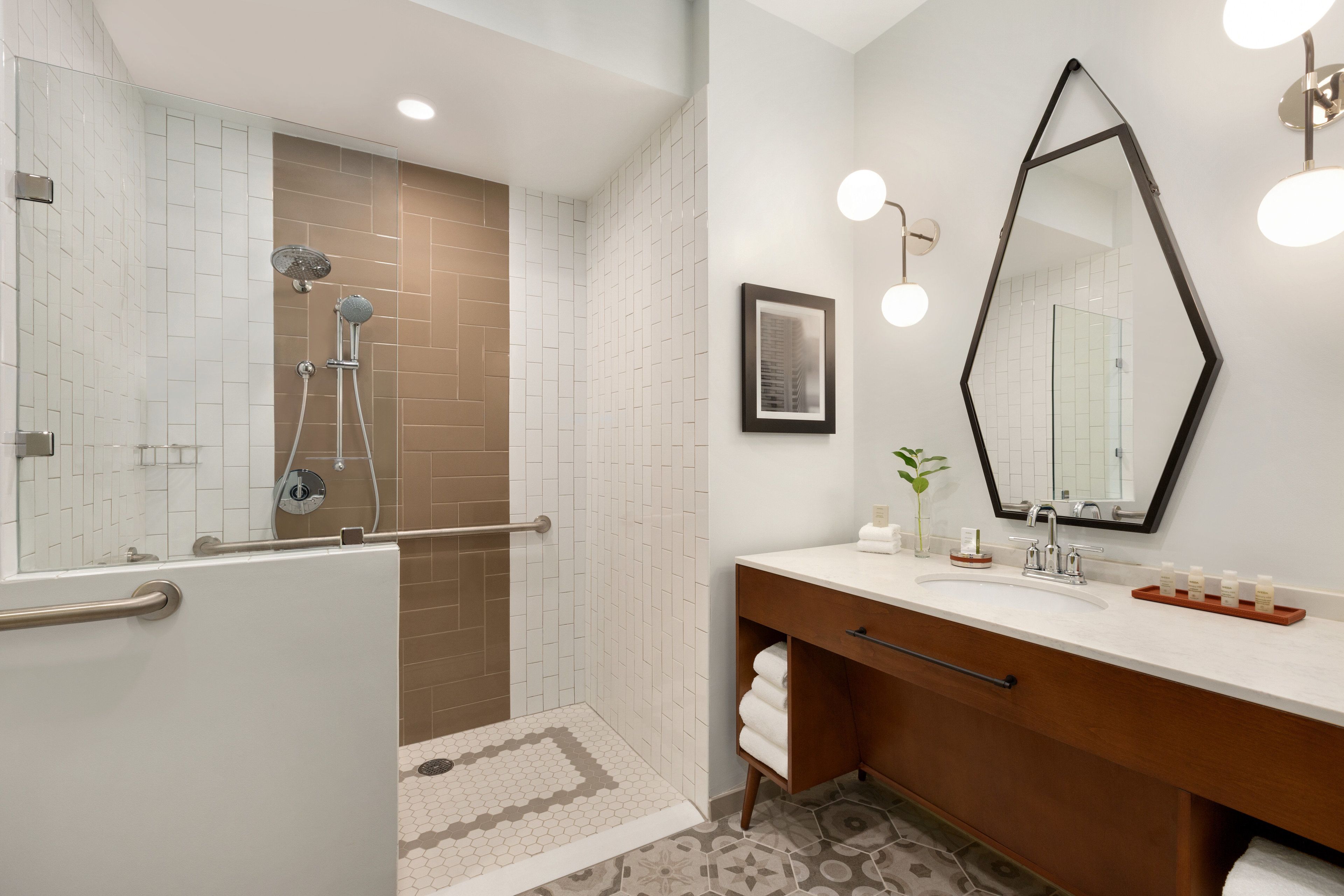 designer toiletries, hair dryer, bathrobes, towels