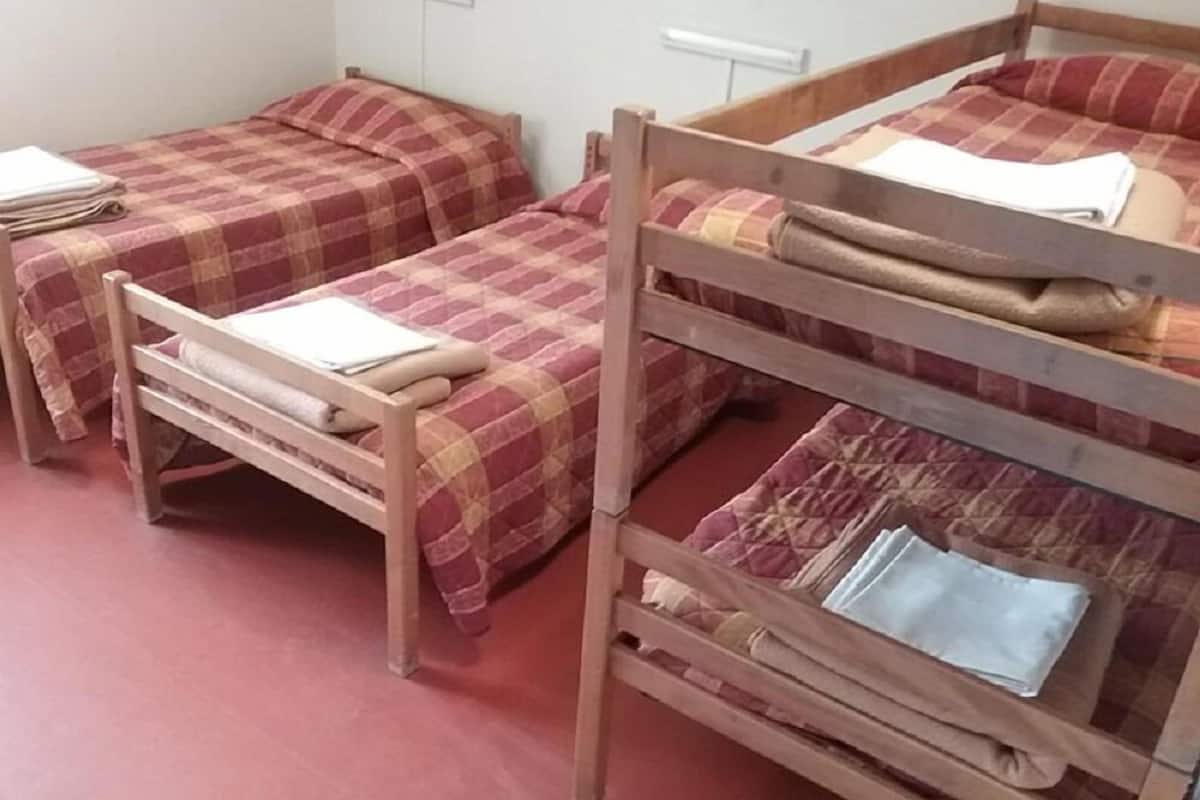 Dormitorio compartido económico | Insonorización, cunas gratuitas, wifi gratis y ropa de cama