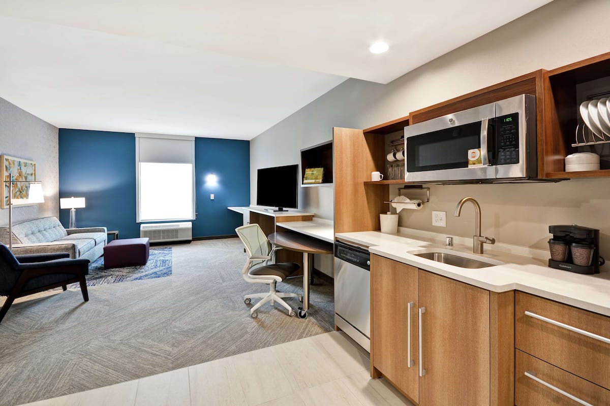 suite, 1 bedroom, non smoking | desk, laptop workspace, blackout curtains, iron/ironing board