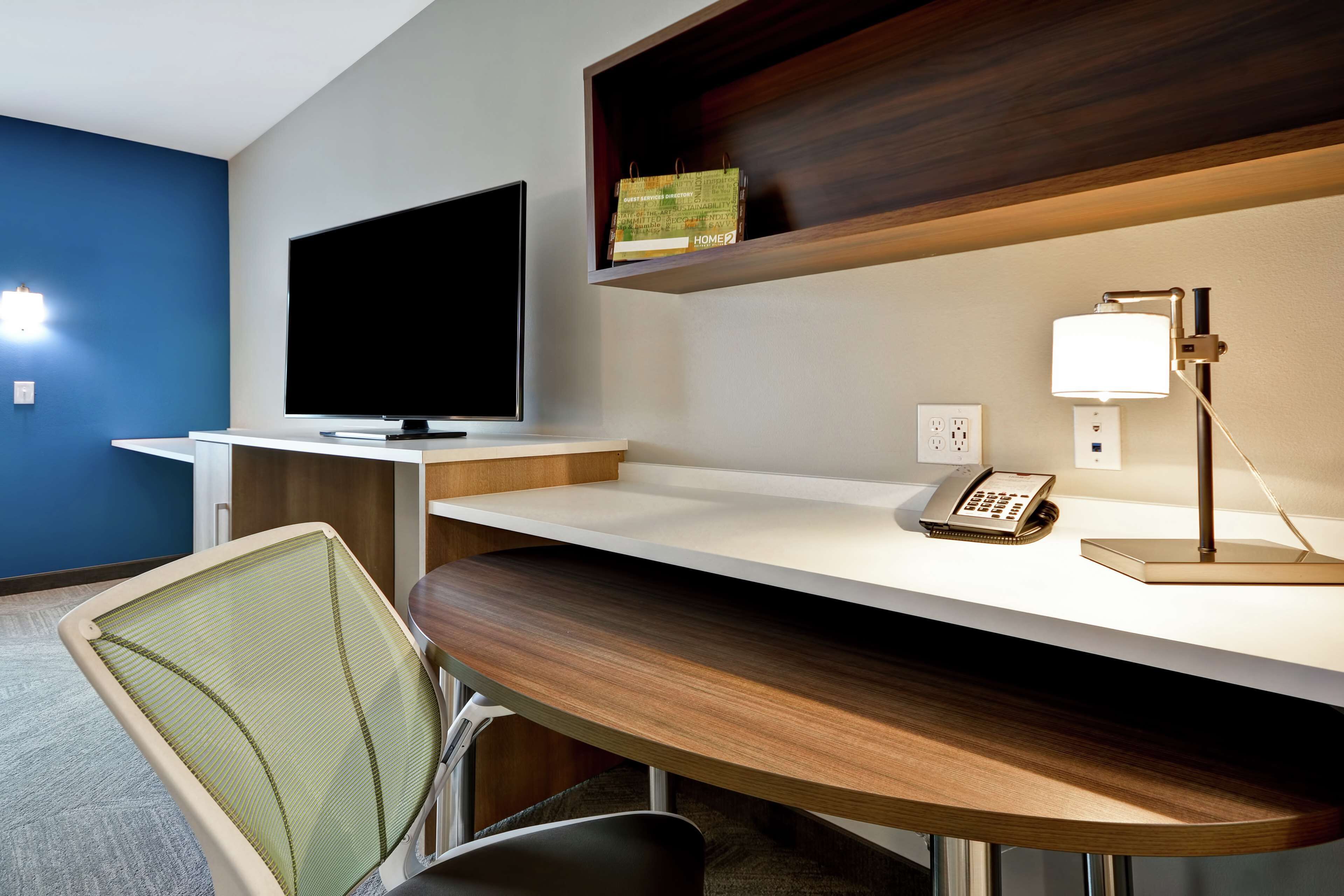 desk, laptop workspace, blackout curtains, iron/ironing board